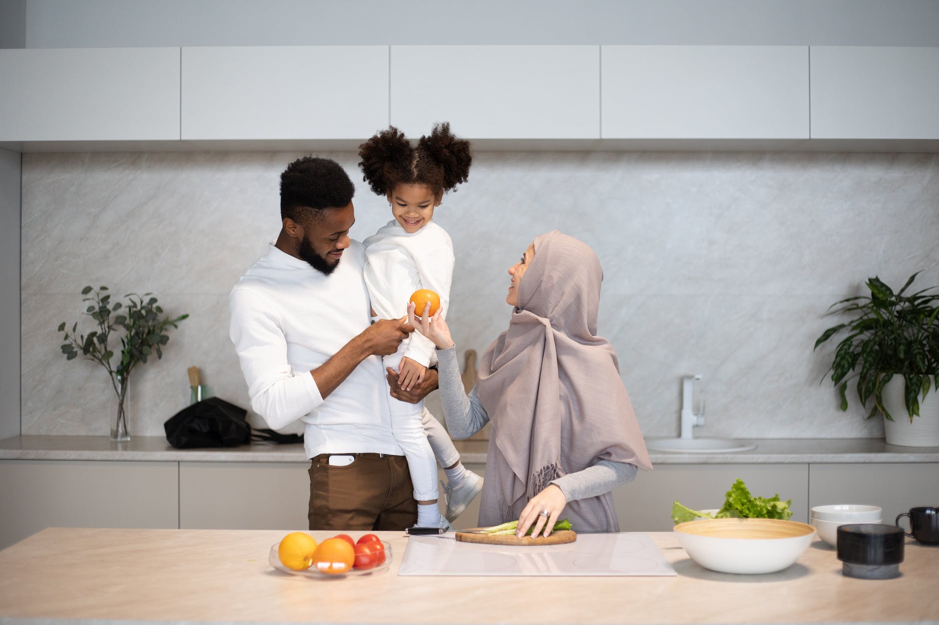5 Simple Ways to Lower Cholesterol Levels 2 content diverse family together in kitchen
